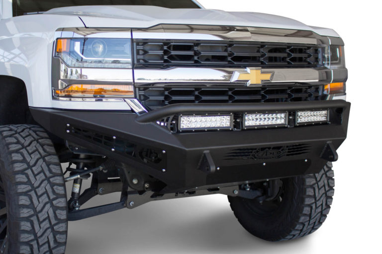 Chevy 1500 Honey Badger Front Bumper with HB logo cutout and 10 dually mounts/universal plate on top and 20" Universal LED bar mounts in center and 10" SR mounts in side panels in Hammer Black and Satin Black Panels