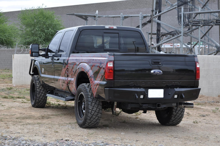 1999 - 2016 Ford F-250/350 HoneyBadger Rear Bumper with lockable storage space and a pair of dually mounts in Hammer Black with Satin Black panels (Does not fit Platinum Edition F-250/350s)